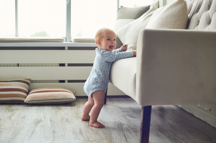 baby standing on feet