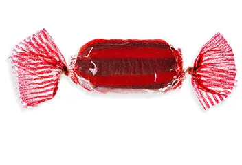 Wrapped red hard candy on white background