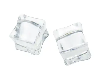 Floating clear ice cubes on plain surface