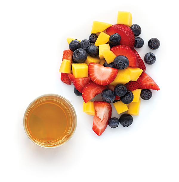 Mixed fruits and juice on white background
